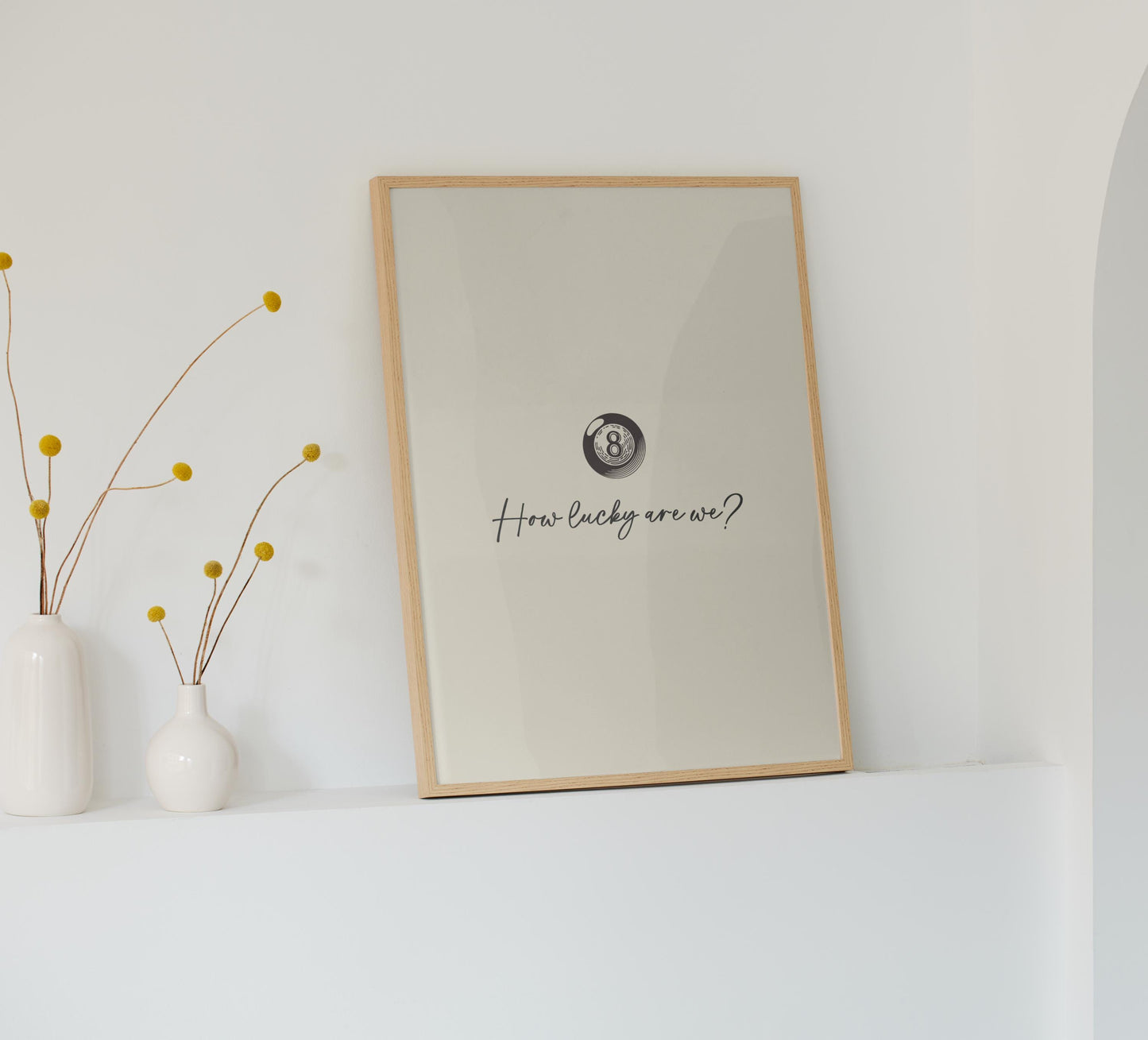 Romantic country lyric print with vintage classic pool ball, styled in frame and leaning against a studio shelf.