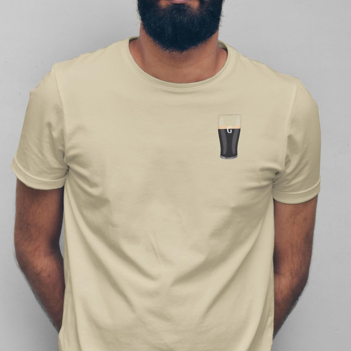 Beer lover’s graphic tee with split G pint and vintage “The Real G Spot” text.