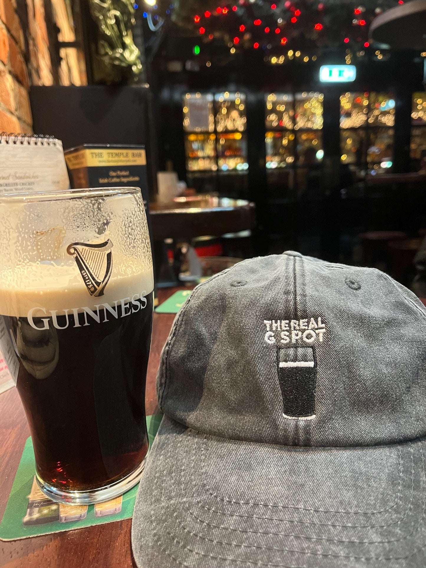 Split the G baseball cap featuring a pint split design, ideal for stout fans. pub culture drinkers gift idea.