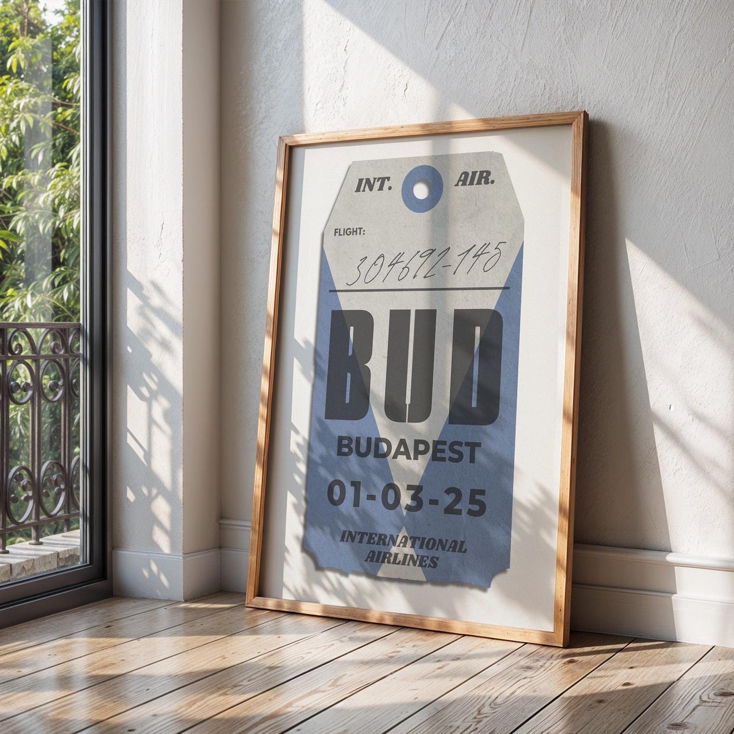 Framed blue luggage tag poster leaning on wall, custom vintage travel gift for holidays and nostalgic flights.