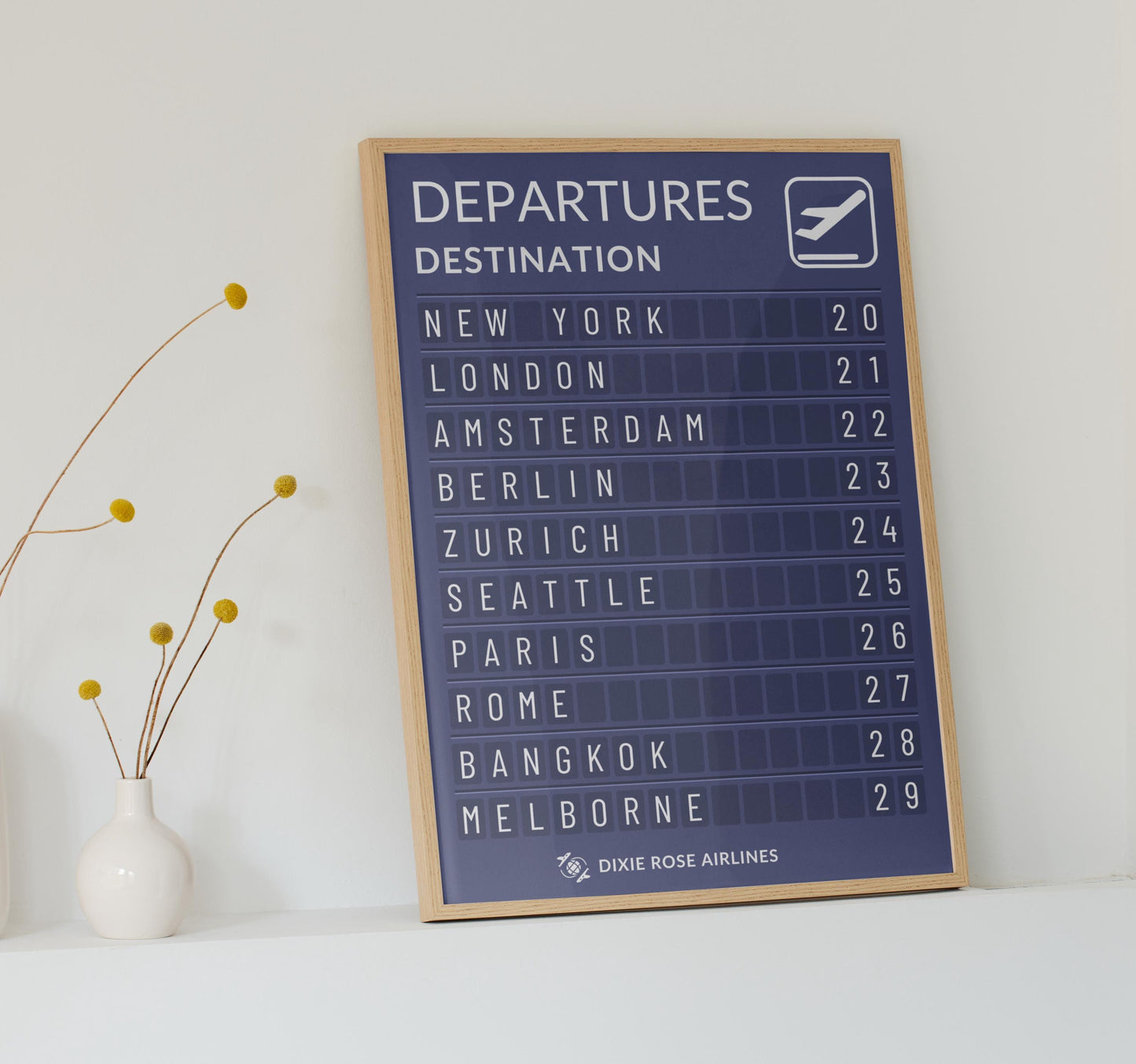 Personalised airport board digital print with travel destinations and dates nostalgic gift for adventurers leaning on wall