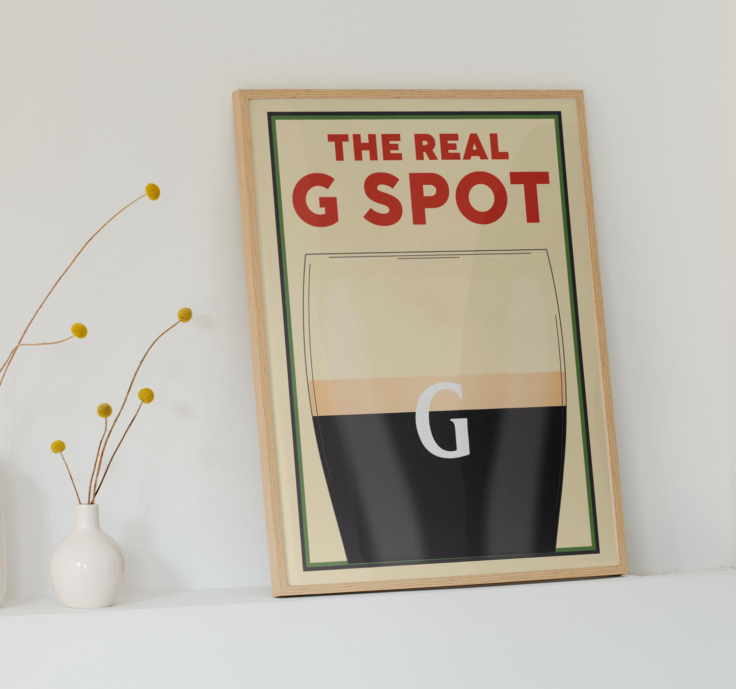 A Vintage poster featuring a pint with the text above saying The Real G spot in reference to splitting the G. This is a perfect funny gift idea for any beer lovers or boyfriends and dads.