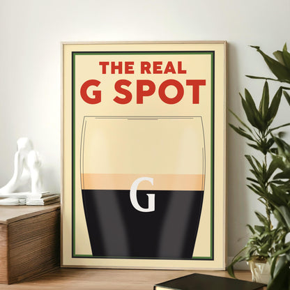 A Vintage poster featuring a pint with the text above saying The Real G spot in reference to splitting the G. This is a perfect funny gift idea for any beer lovers or boyfriends and dads.