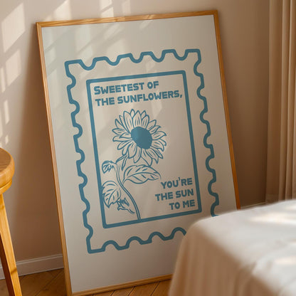 blue cowgirl lyric poster with stamped edge and sunflower, leaning in bedroom, western vibe, great gift for country fans.
