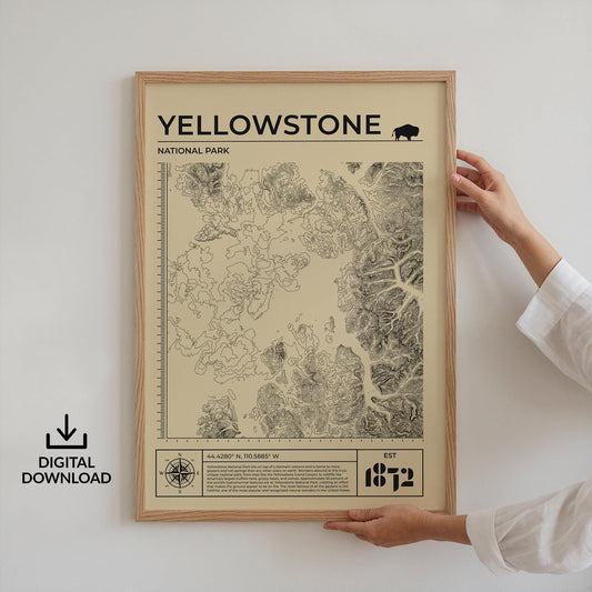 Digital download Yellowstone topographic art file in yellow being held up, perfect for nature and hiking lovers.