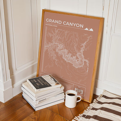 Framed Grand Canyon topographic poster in terracotta, perfect gift for hikers and nature lovers.