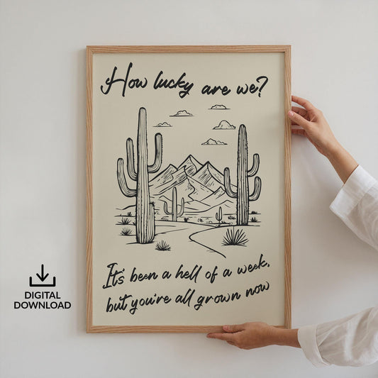 Digital country western lyric poster with desert background and “how lucky are we?” downloadable wall art for rodeo fans.