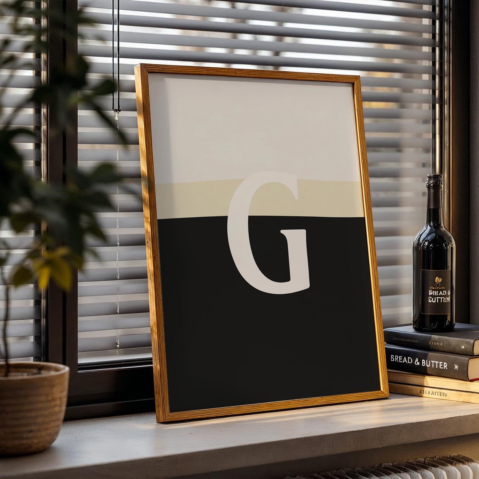 Detailed pint glass close-up with split G artwork, trendy monochrome print for pub and bar decor.