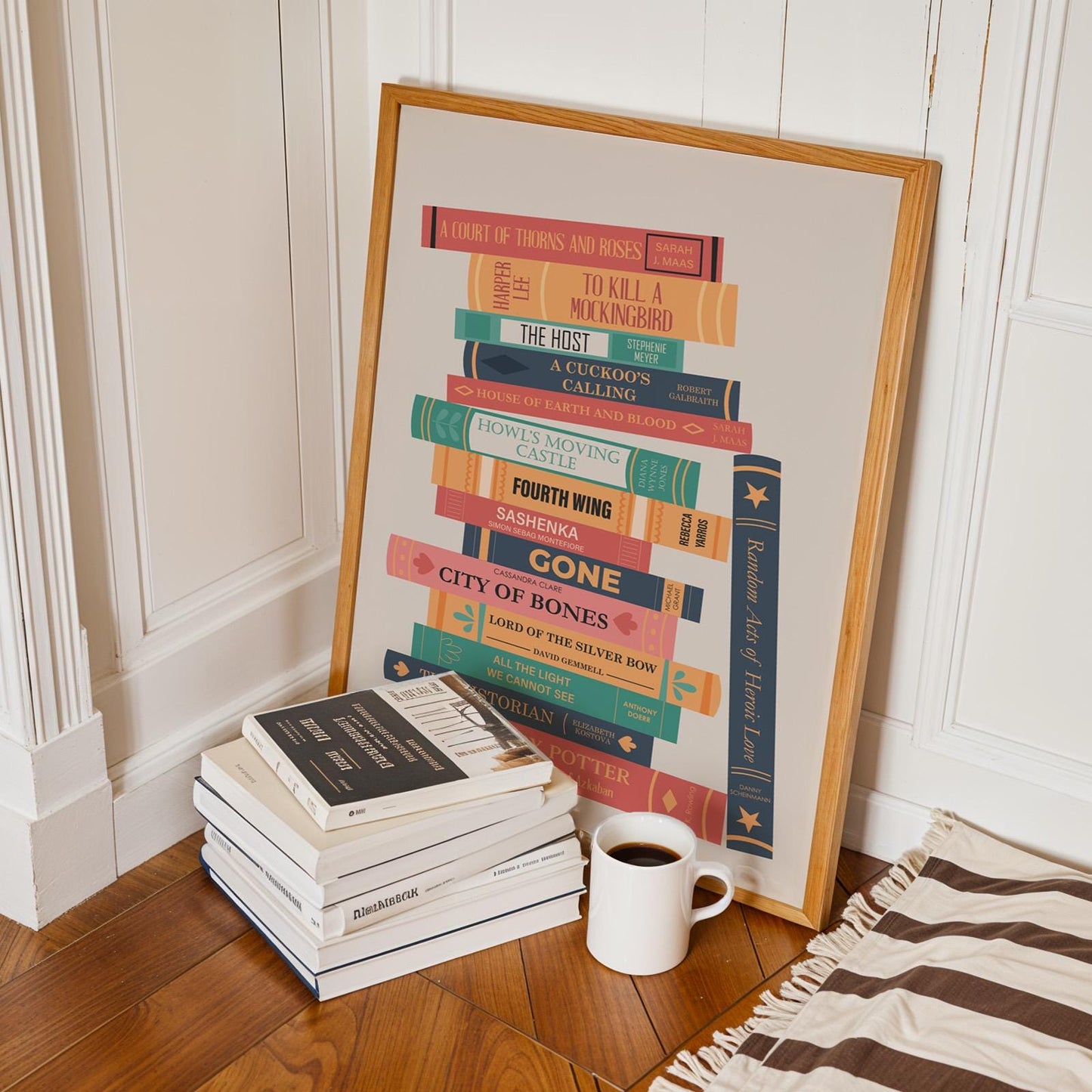 Aesthetic framed reader stack print leaning on wall bespoke gift idea for book lovers and reading nook decor