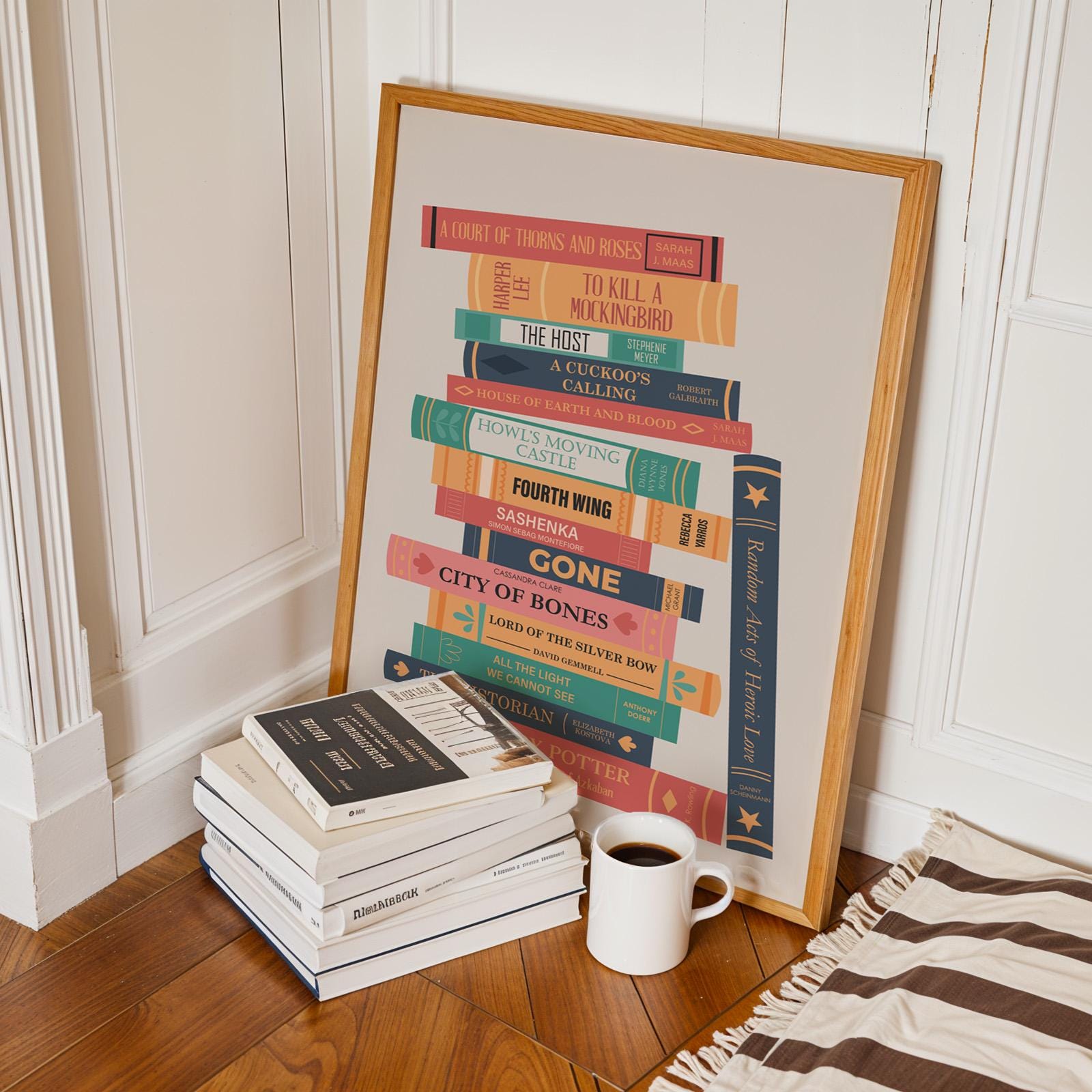 Aesthetic framed reader stack print leaning on wall bespoke gift idea for book lovers and reading nook decor