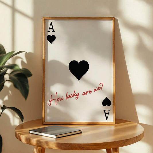 Romantic cowboy-themed wall art with black hearts and “How lucky are we” in red script perfect for country homes