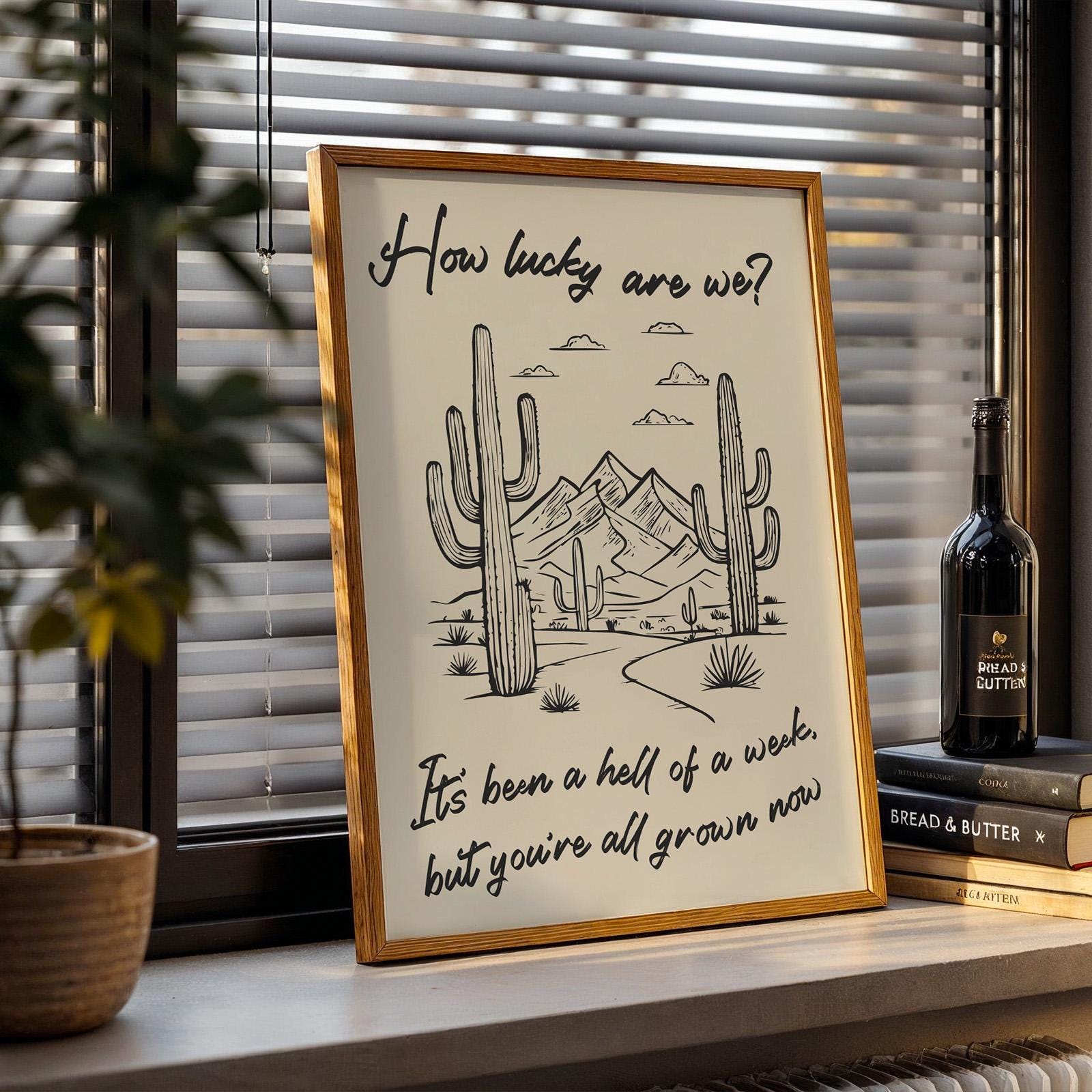 Western cowboy digital lyric print with desert illustration, “how lucky are we?” phrase, great music musician wall art.