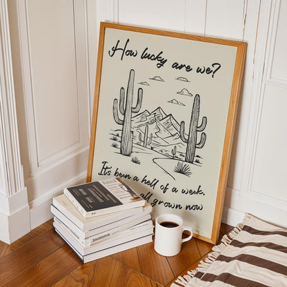 Western style lyric wall art with desert illustration and “how lucky are we?” phrase, great gift for country décor.
