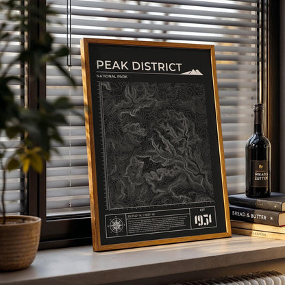 Rustic Peak District topographic print framed, leaning on shelf, perfect nature and camping gift.