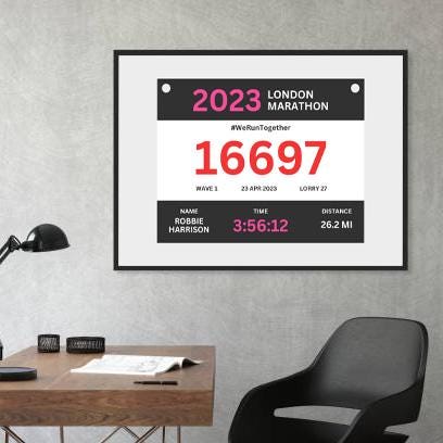 Running bib print with marathon date and time, in frame in home office. Unique runner gift, marathon race souvenir.
