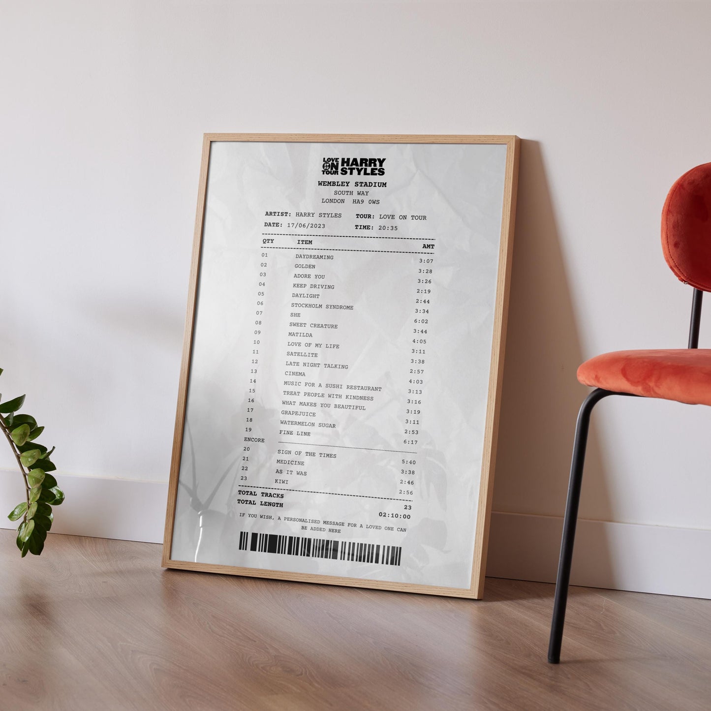 Setlist receipt digital file customised with your band artist songs great printable keepsake for fans. Oak frame leaning on wall