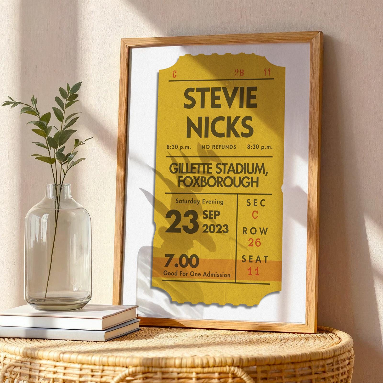 Framed custom ticket artwork in mustard yellow, physical vintage-style keepsake for music lovers.