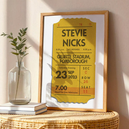 Framed custom ticket artwork in mustard yellow, physical vintage-style keepsake for music lovers.