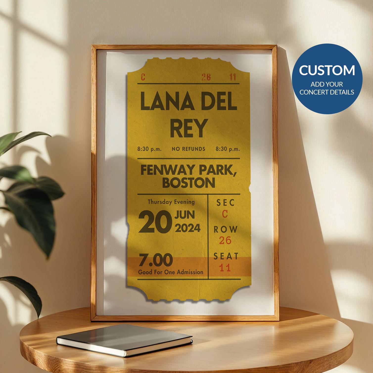Framed personalised festival ticket print in mustard, bespoke vintage print leaning on wall.