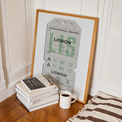 Framed cream departures tags travel print leaning on floor, bespoke holiday travel gift for flights and memory keepsakes.