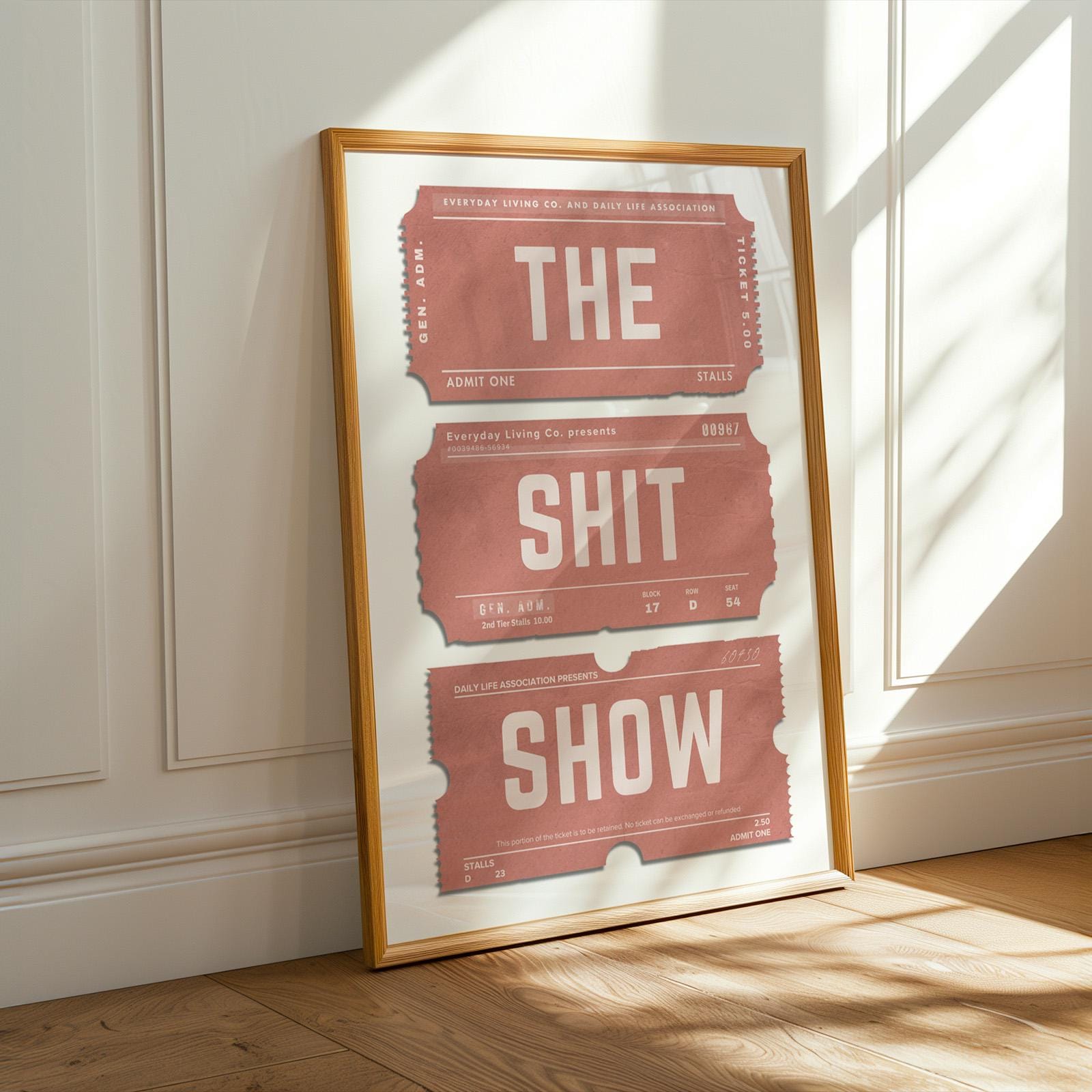 a funny cheeky and rude wall art on worn old event passes.