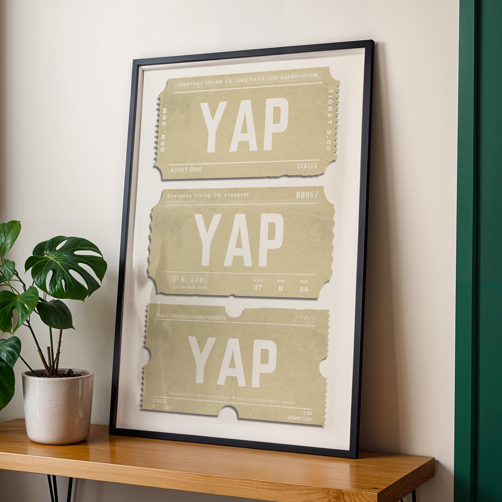 a beige minimalist trendy stub print leaning on wall in black frame