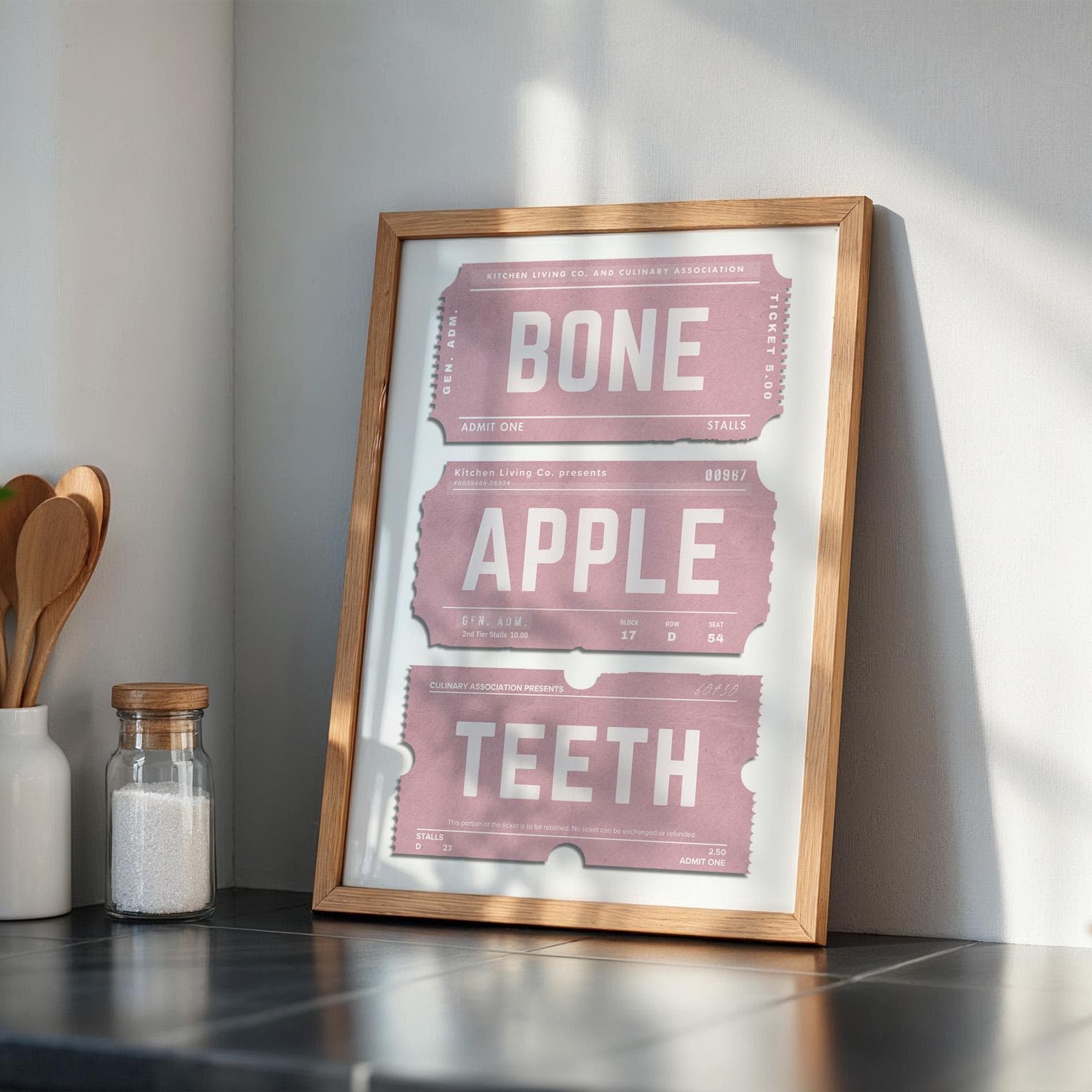 a pink ticket stub print saying bone apple teeth as a play on words pun. funny gift idea