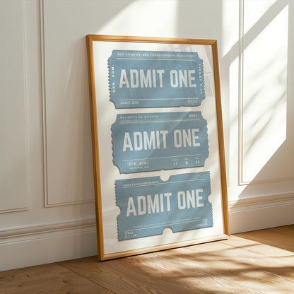 a oak framed poster in a blue colour with old worn event tickets for cinema or concert.