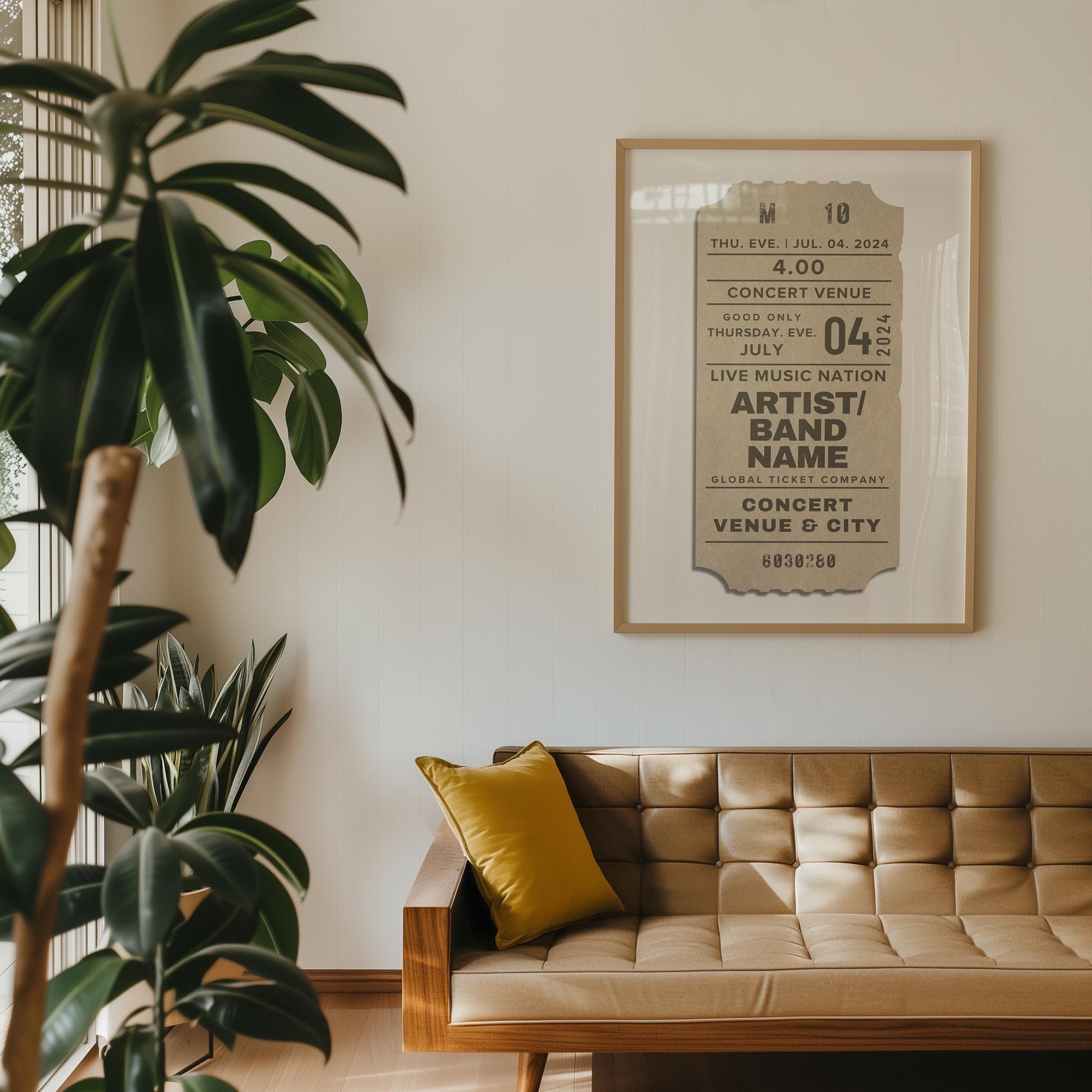 Beige framed concert ticket print, leaning decor piece with personalised design and vintage flair.