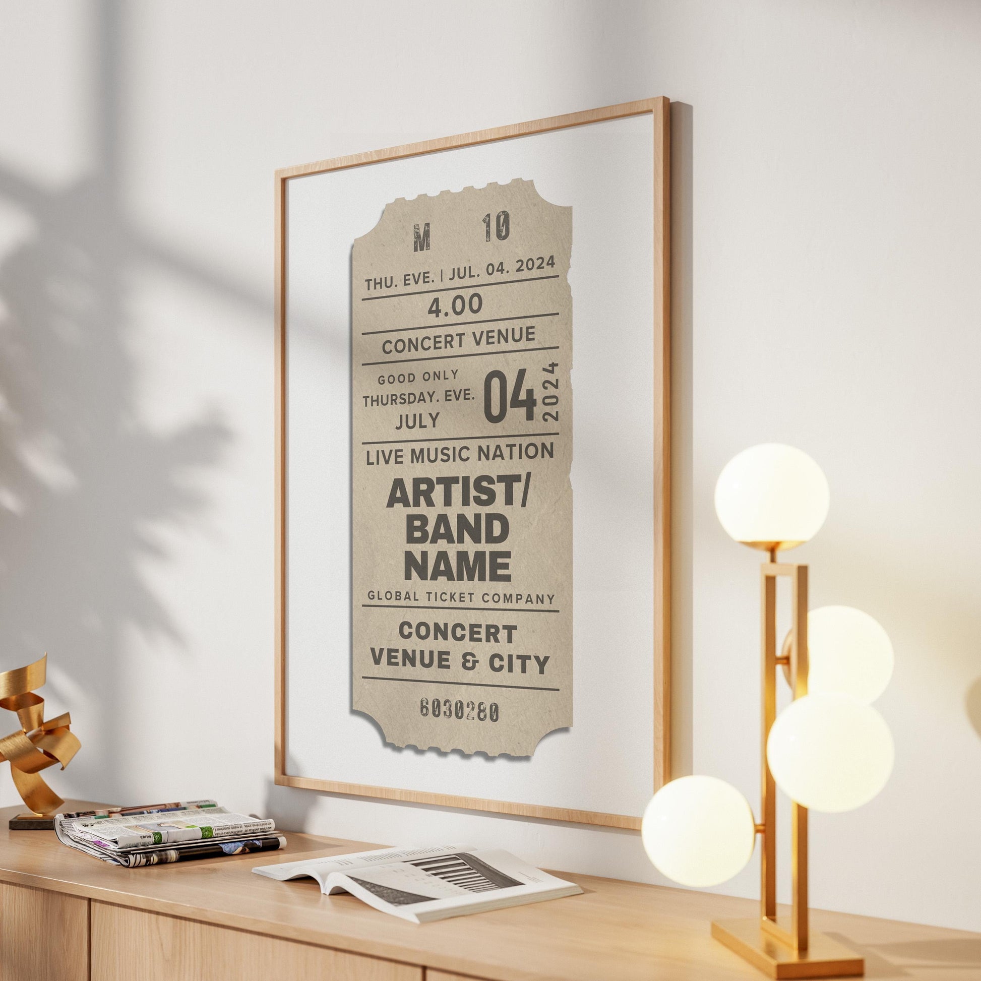 a minimalist elegant home with a framed custom art piece on the wall. A bespoke made neutral beige coloured old event stub.