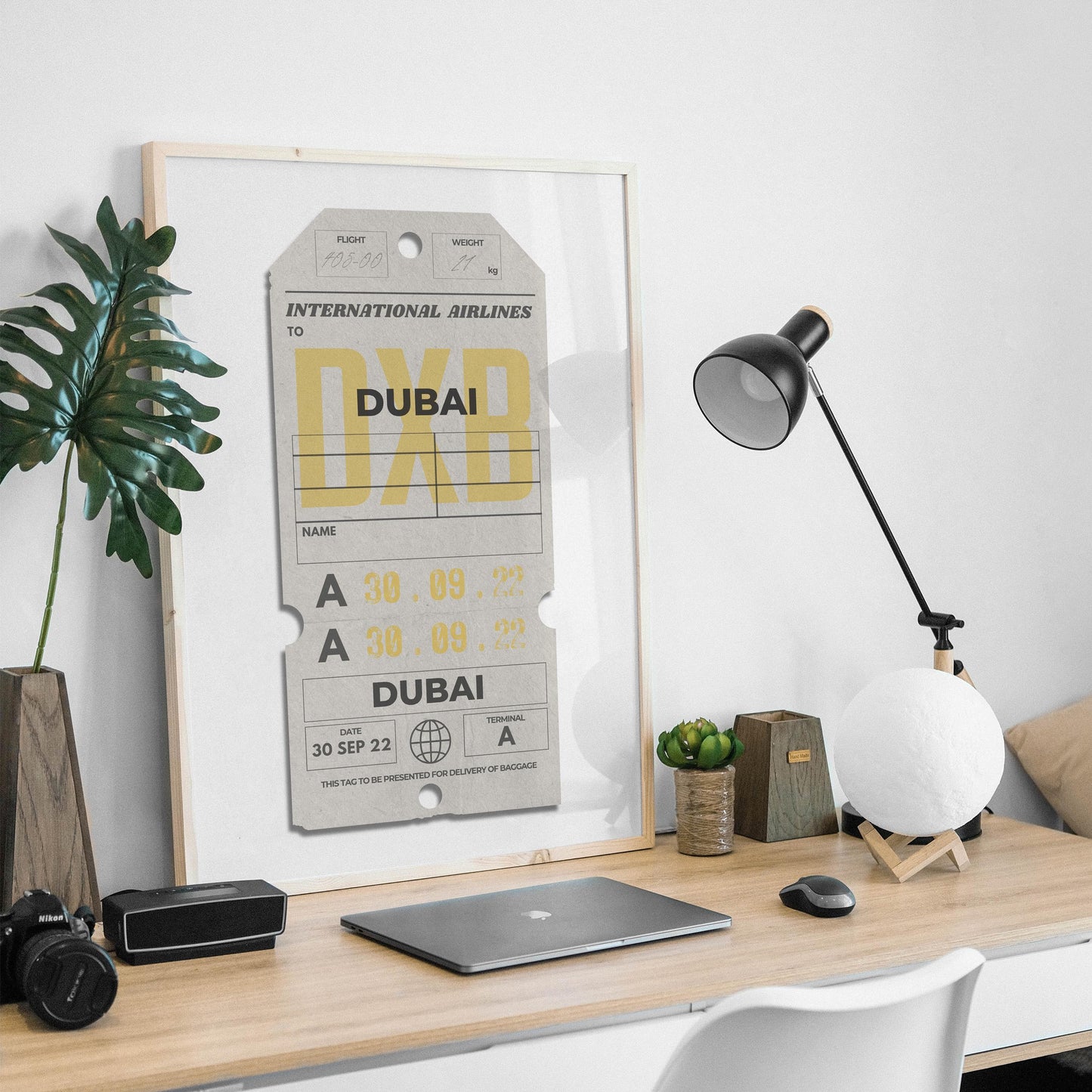 Framed neutral flight pass traveller wall art leaning on wall, custom travel gift for nostalgic airport memories and holiday flights.