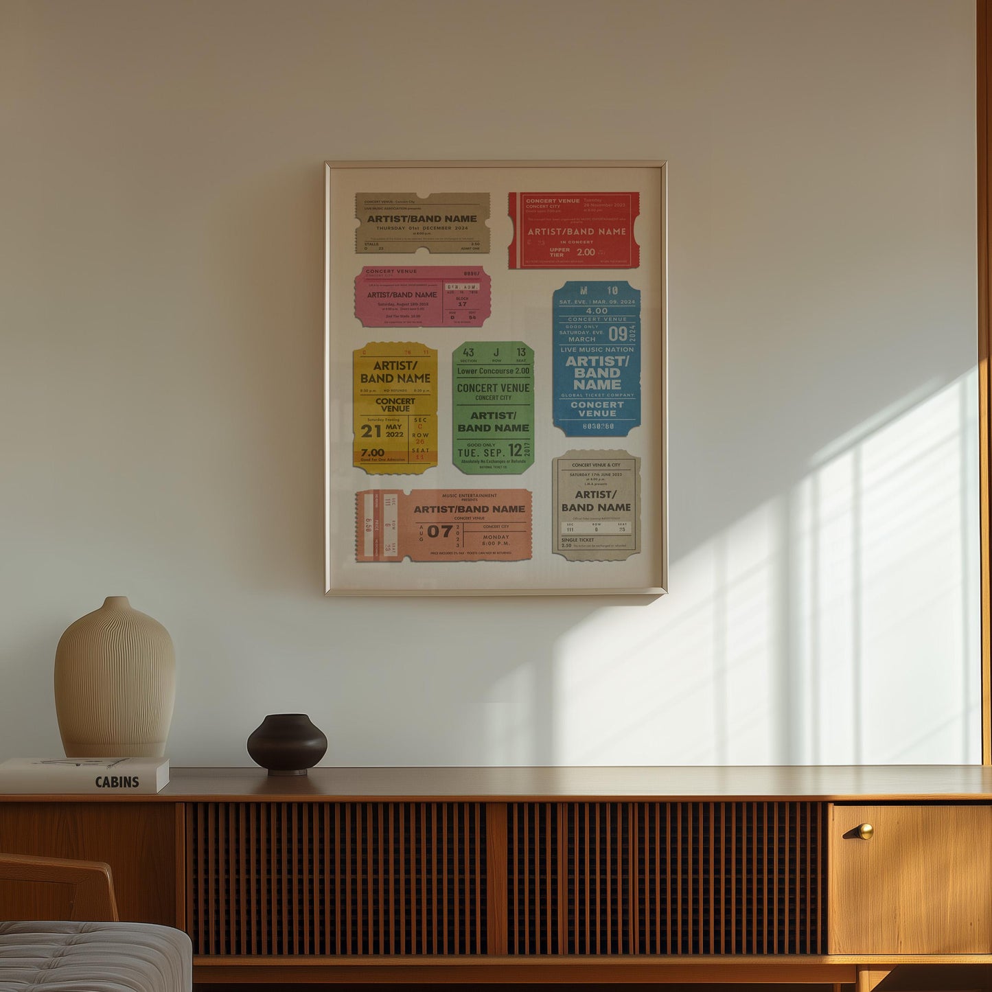 minimalist home with white framed memory wall art. 3D effect ticket stubs for band and gig events.