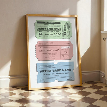 a wooden framed poster leaning on wall in kitchen. Set of 3 old concert stubs custom to your events.