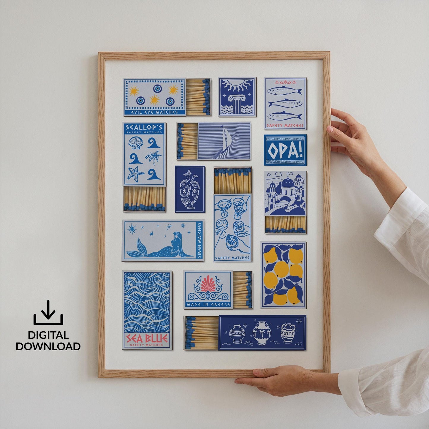A print in a frame with multiple matchbox designs in blue and yellow. The illustrations depict a mermaid, fish, and the text "SEA BLUE". The frame is made of light-coloured wood. A note to say this is a digital file ready to download and print.