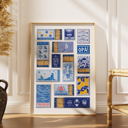 An eclectic art piece showcasing matchbox designs in blue and white, with illustrations of lemons and Greek motifs. The text includes "Siren Matches". The matches are visible within the boxes.