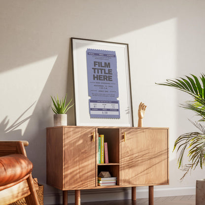 framed poster leaning on counter in lounge of retro inspired house.