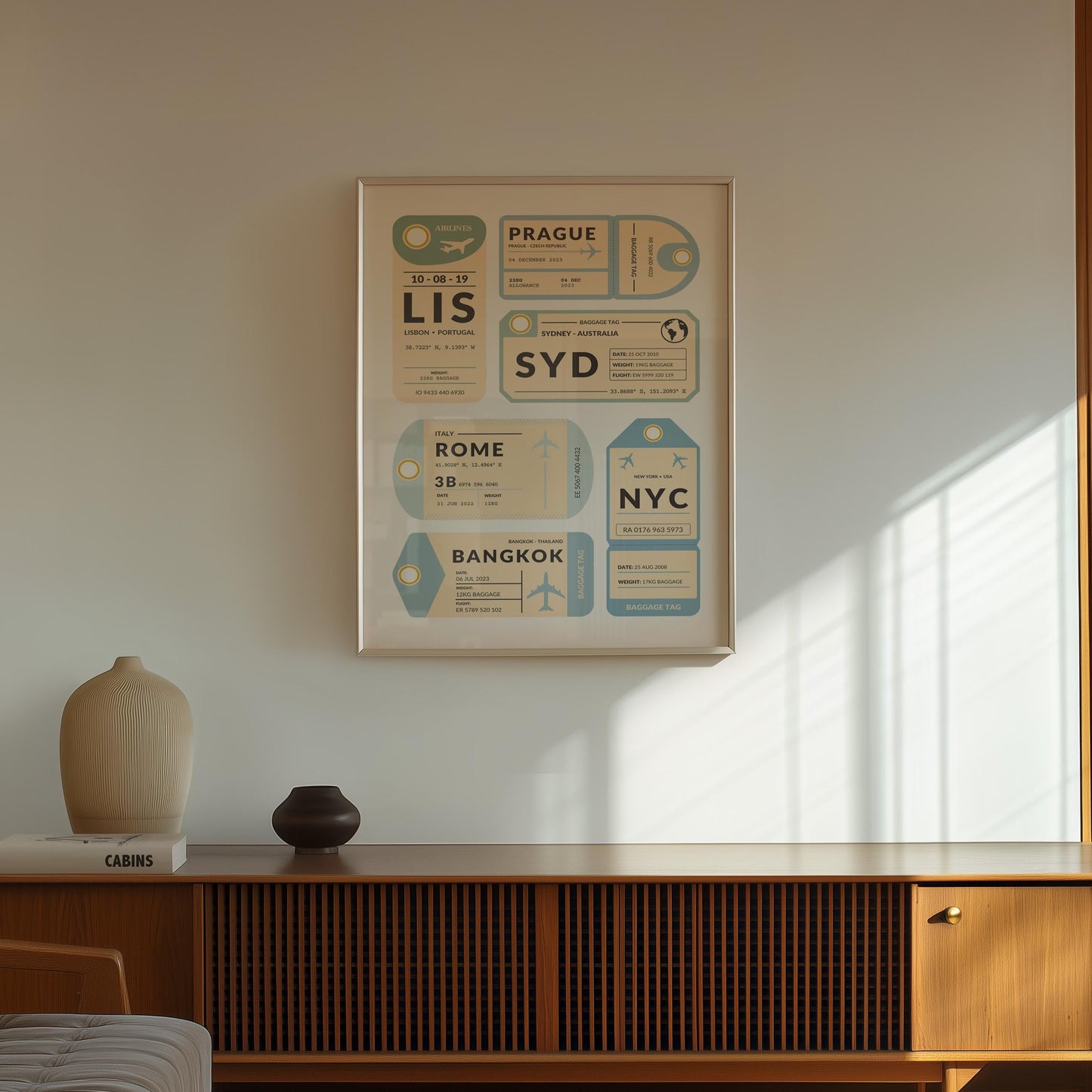 scandi boho vibe apartment with a white framed print on the white wall. A blue travel destination tag stub print.
