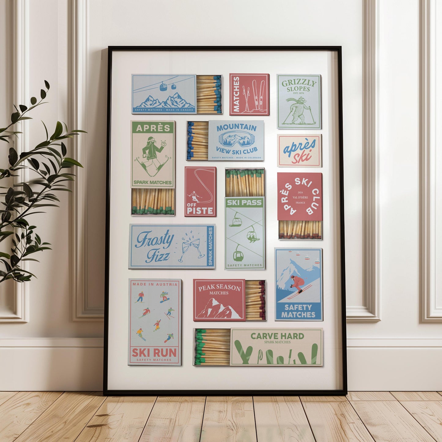 An art piece showcasing vintage matchbox designs with winter chalet resort themes. The boxes feature text such as "Grizzly Slopes," "Ski Run," and "Carve Hard." The color scheme includes blues, reds, and greens, giving a retro feel.