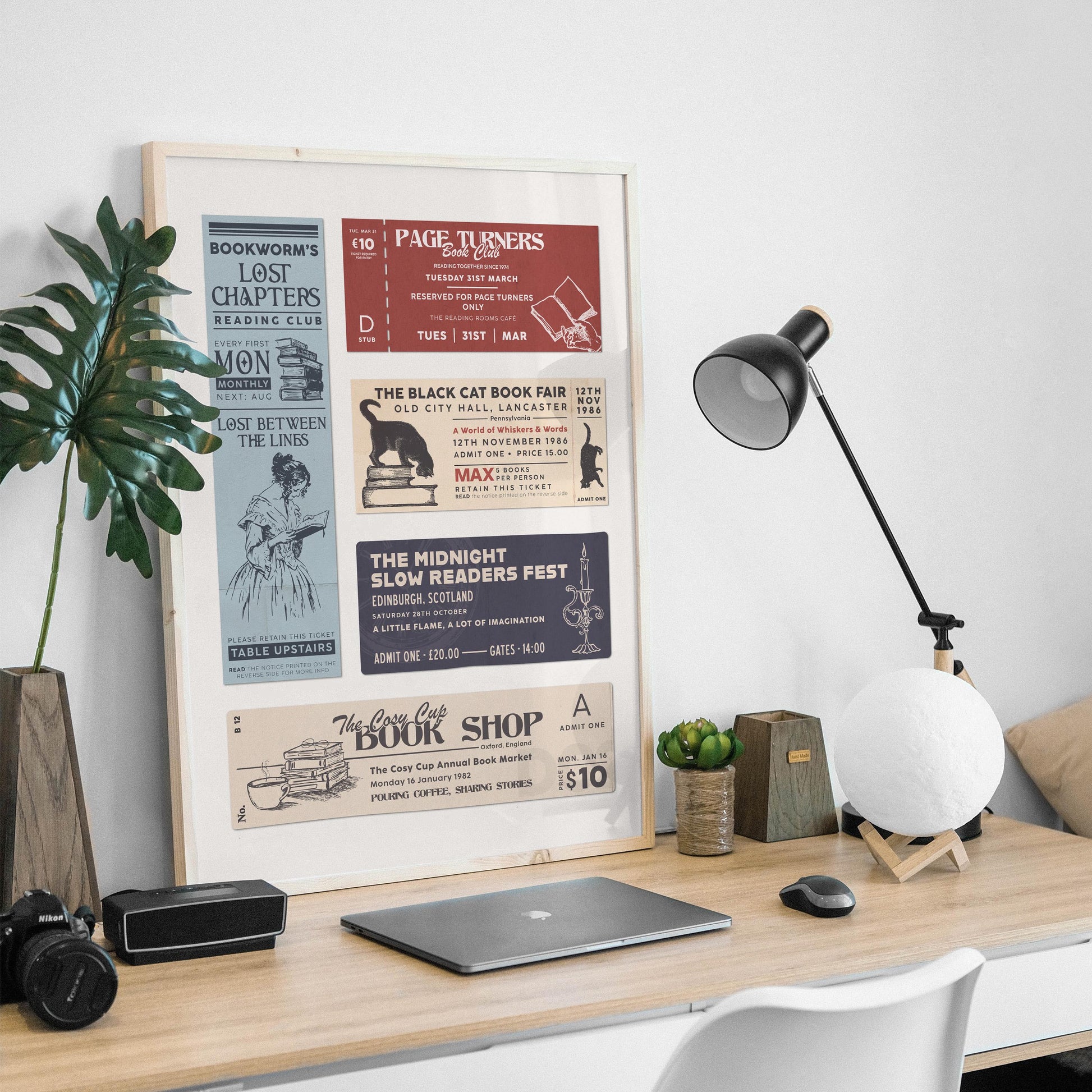 readers motif stubs on a white background on a wall art piece. on a masculine office desk with a lamp and plant.
