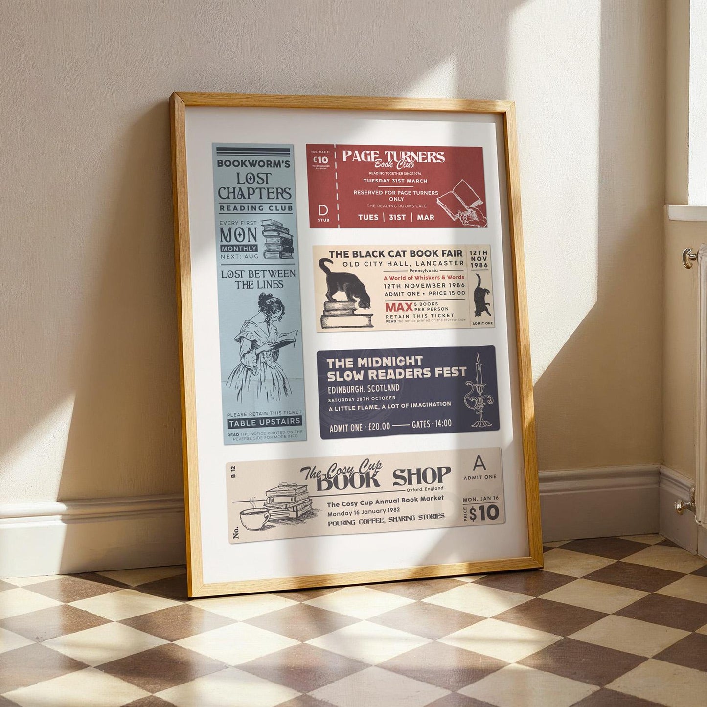 An art piece displaying retro stubs for reading events. The ticket, in shades of red, blue, and cream, include text like "Page Turners Book Club". The frame is natural wood.