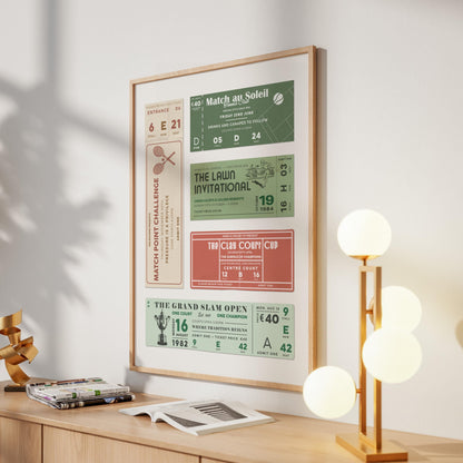 An oak framed poster in a hallway of a home near a round lamp. The art is a tournament ticket stub wall art piece