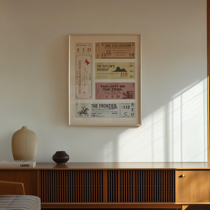 A dark wood tv unit with minimalist vases on top. A pastel rustic tone cowboy ticket print is on the wall above.