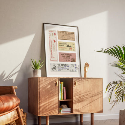 A retro home living room with a rodeo Americana style chic boho art framed in black leaning on a wood cabinet.