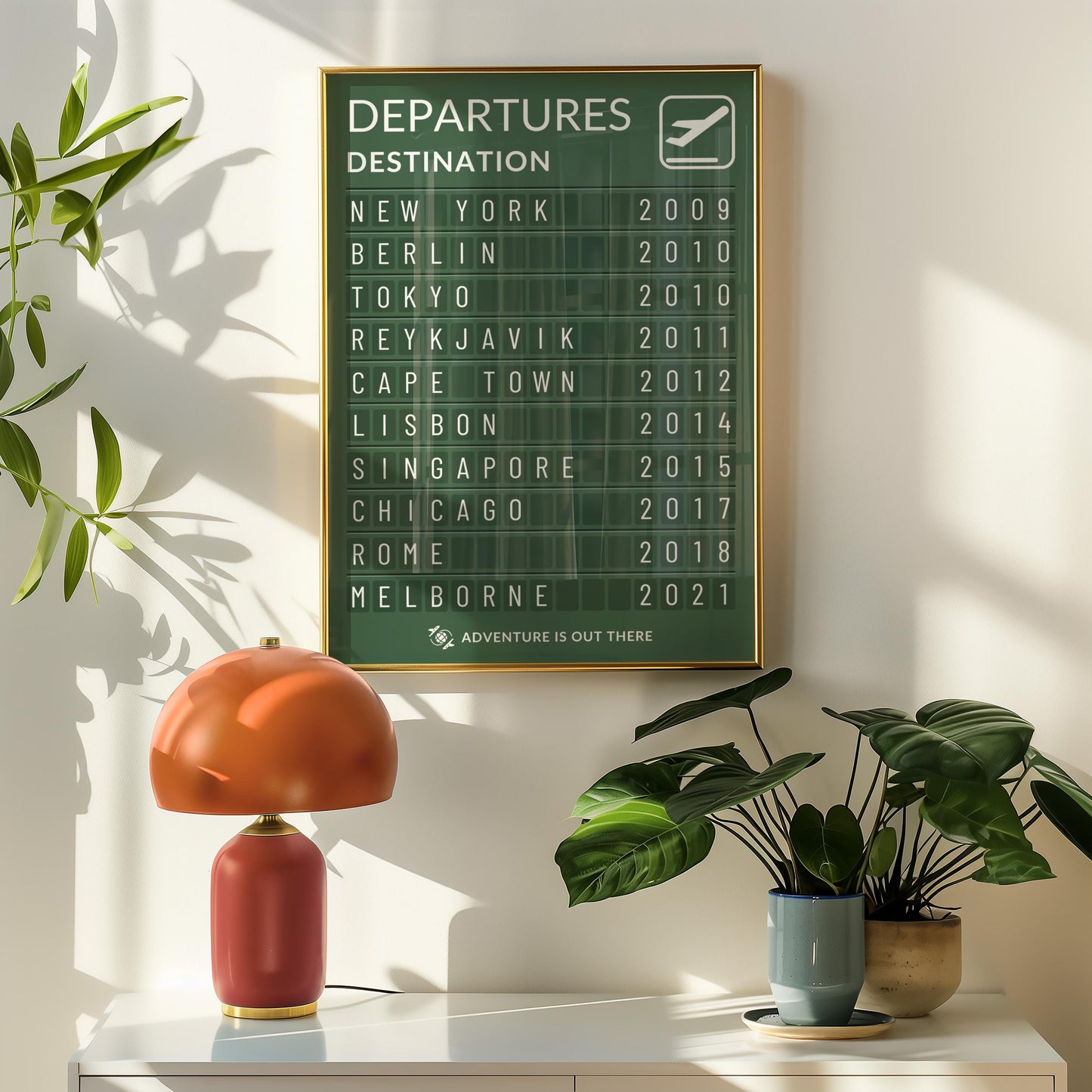 A cozy living room with a retro lamp and plant on a shelf. A green departures plane inspired art piece is on the wall above.