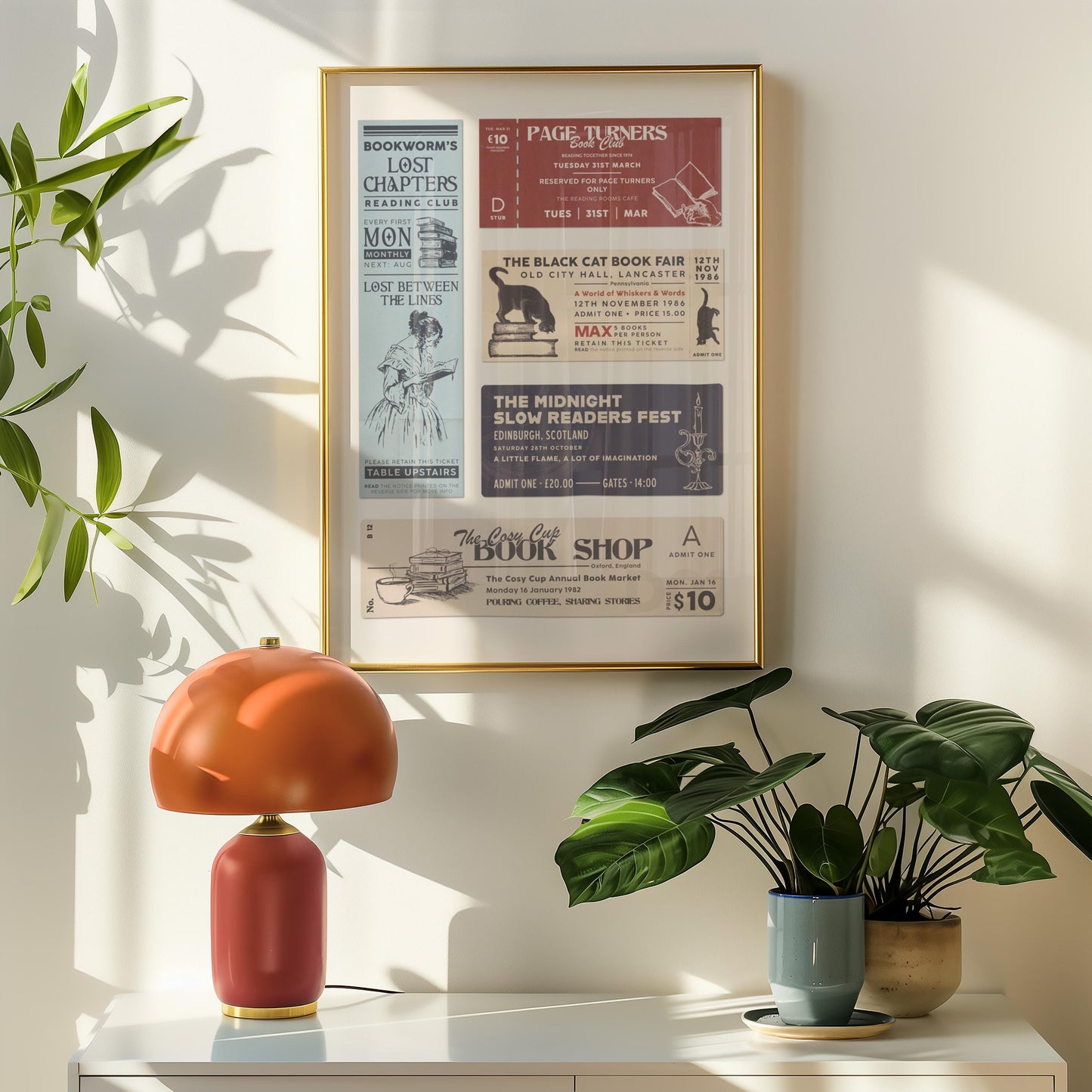 retro orange lamp on a sideboard with a framed print featuring old school ticket stubs for a slow readers club and midnight page turners event