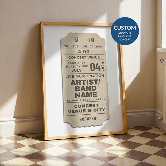 Soft neutral concert ticket poster, framed and leaning on a wooden counter, ideal music decor gift.