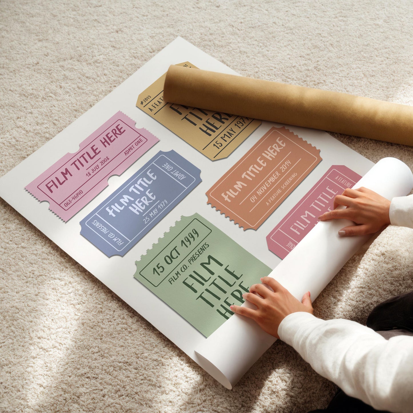 A colourful child like poster being rolled up on floor. It is a unique bespoke made design featuring favourite films.