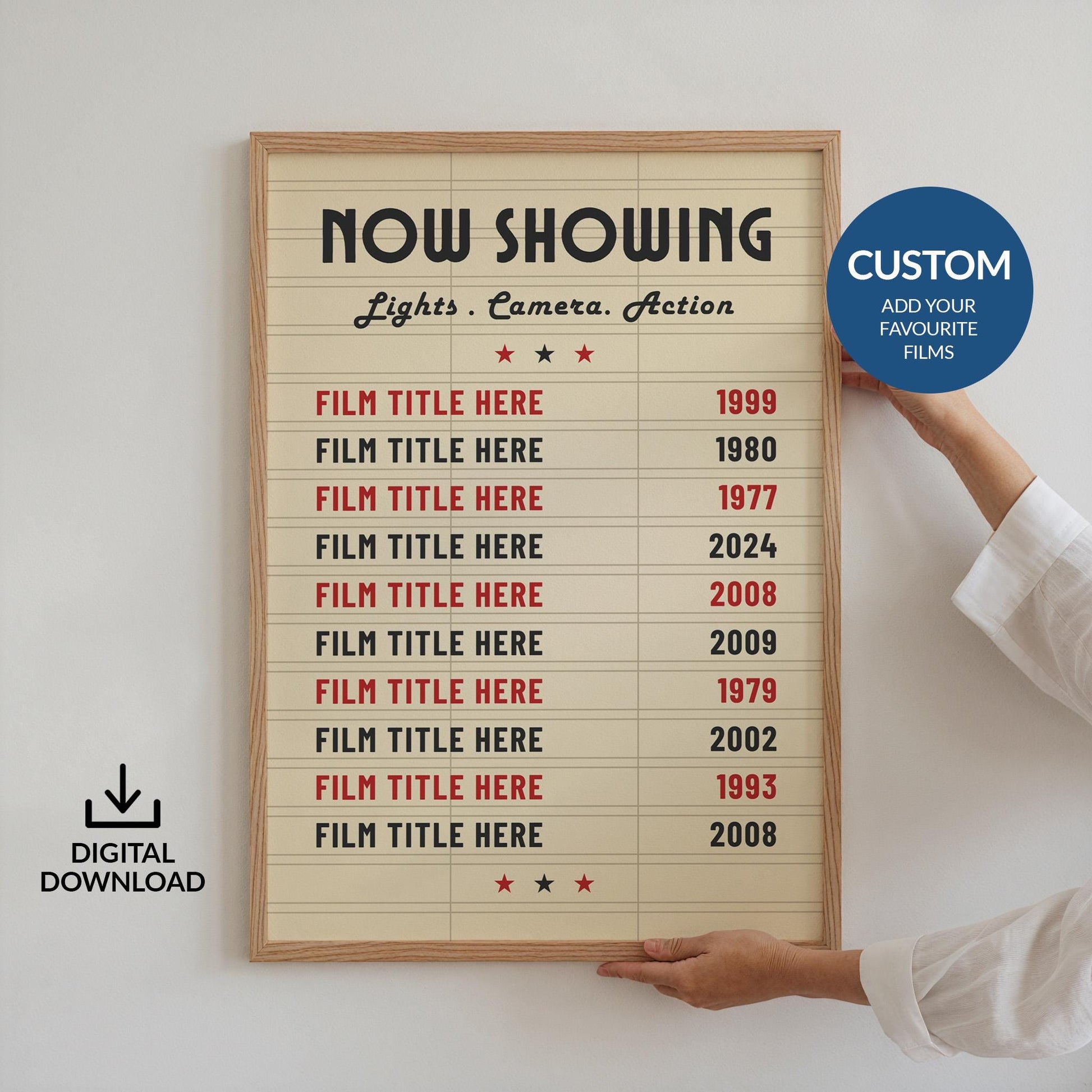 A white wall with someone holding up a framed vintage movie print, customised with up to 10 tickets.