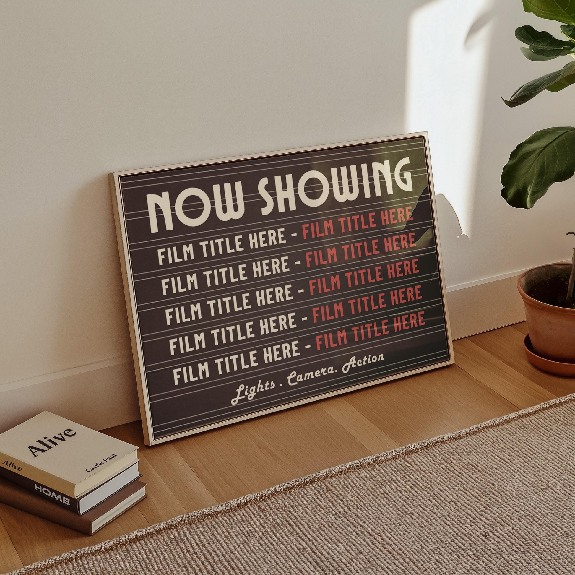 A hallway with a landscape print on the floor. The art is a vintage letterboard saying "NOW SHOWING" as a title. Below is ten of a movie lovers picks of movies.