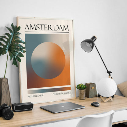 An abstract print is on a wooden desk, with a black desk lamp and a moon-shaped light in a masculine home office. The art gives a zen modern aesthetic.